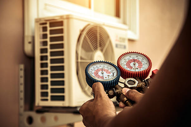 Professional Air Conditioning Service technician working in Austin, AR